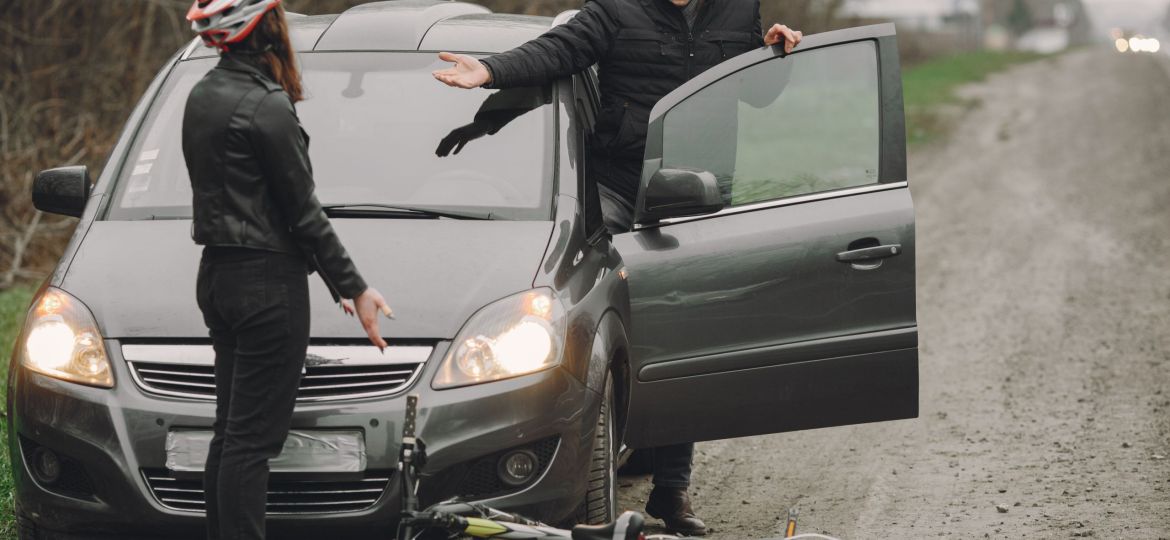 Road accident with cyclist man driver and car